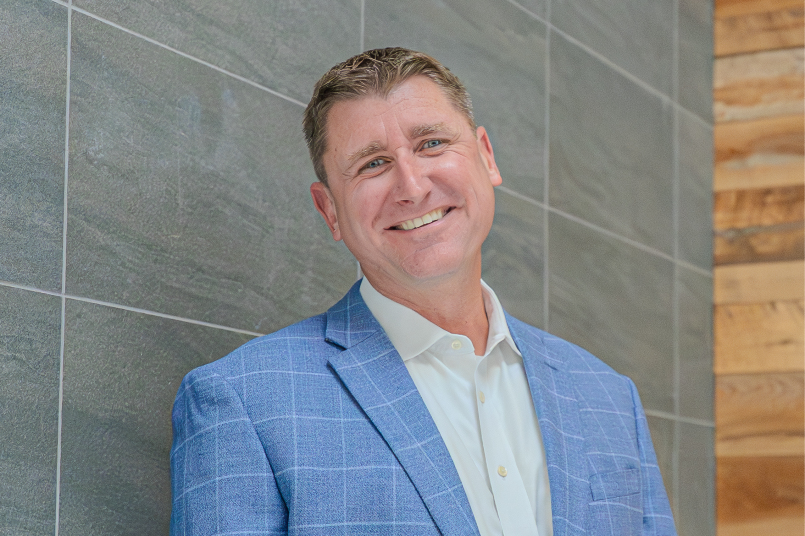 Professional portrait of Mike Sandkuhler.