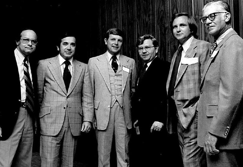 Historical photograph of HBAV board members and leadership gathered for a meeting.