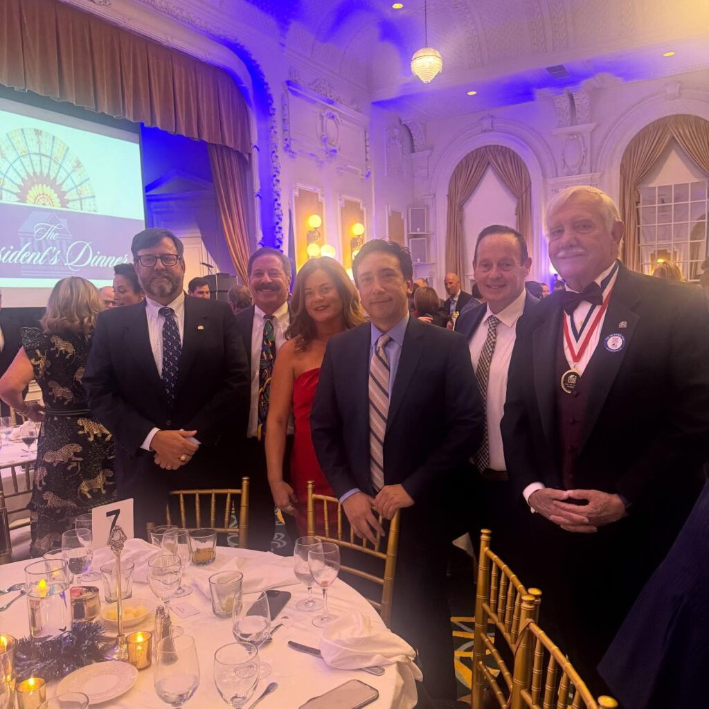HBAV 2026 Woman of the Year, Brooke Selden, stands with other members of the Costen Floors team at an Awards Reception.